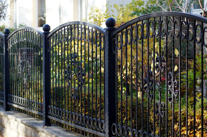a close up of a metal fence