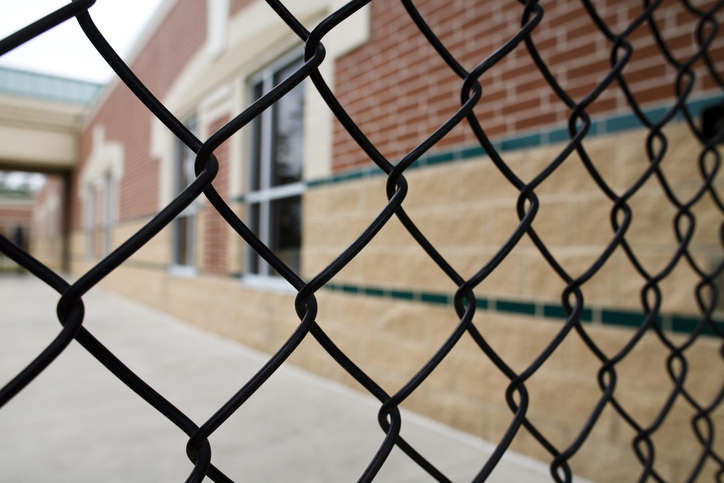 a close up of a metal fence