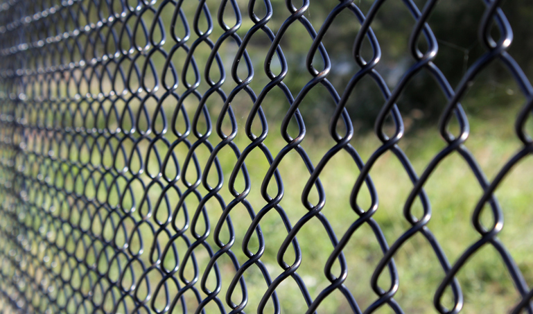 a close up of a fence