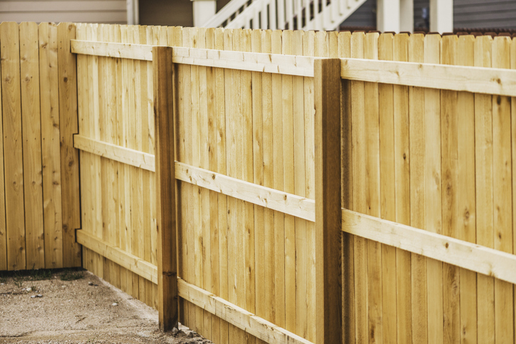 a close up of a wooden fence