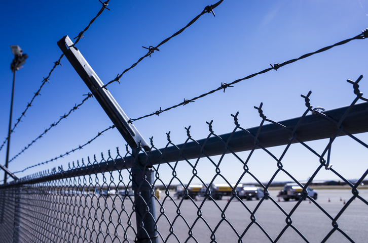 a close up of a wire fence